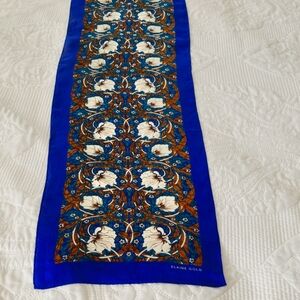 GORGEOUS SILK SCARF BY ELAINE GOLD ,HAND ROLLED EDGES. 52X10 INCHES LONG.